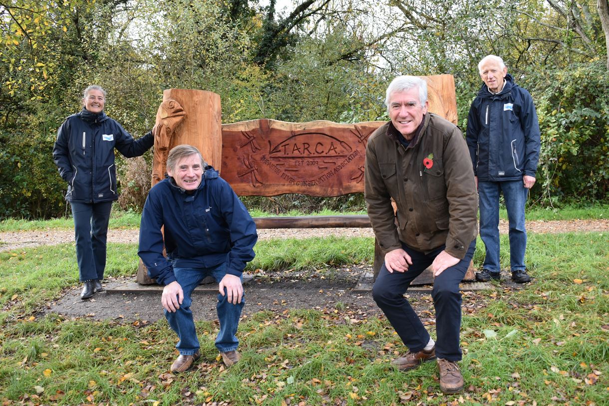 Councillors Tony Burley and Ian Jeffrey alongside Kate Savage (upper left) and Mervyn Gist (upper right) alongside the new bench.