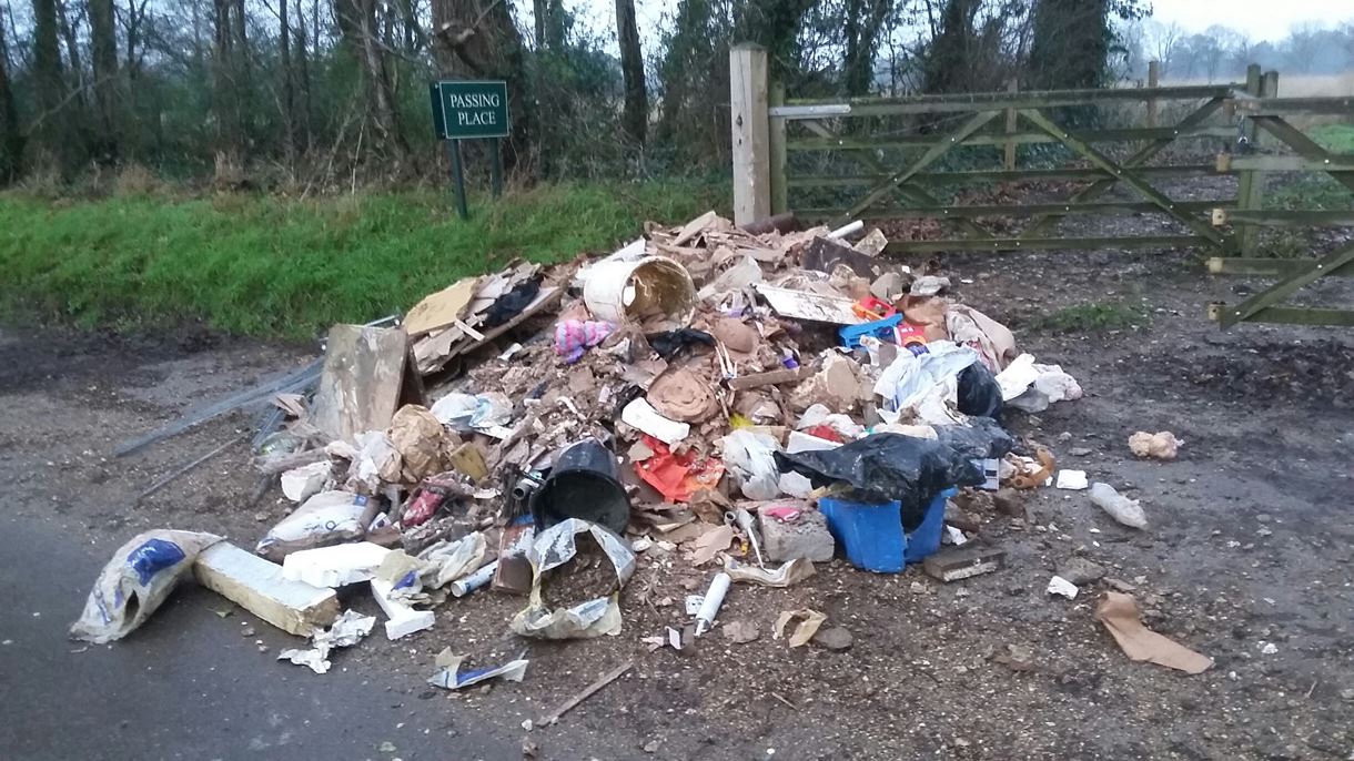 Building materials Fly-tipped on Spaniards Lane