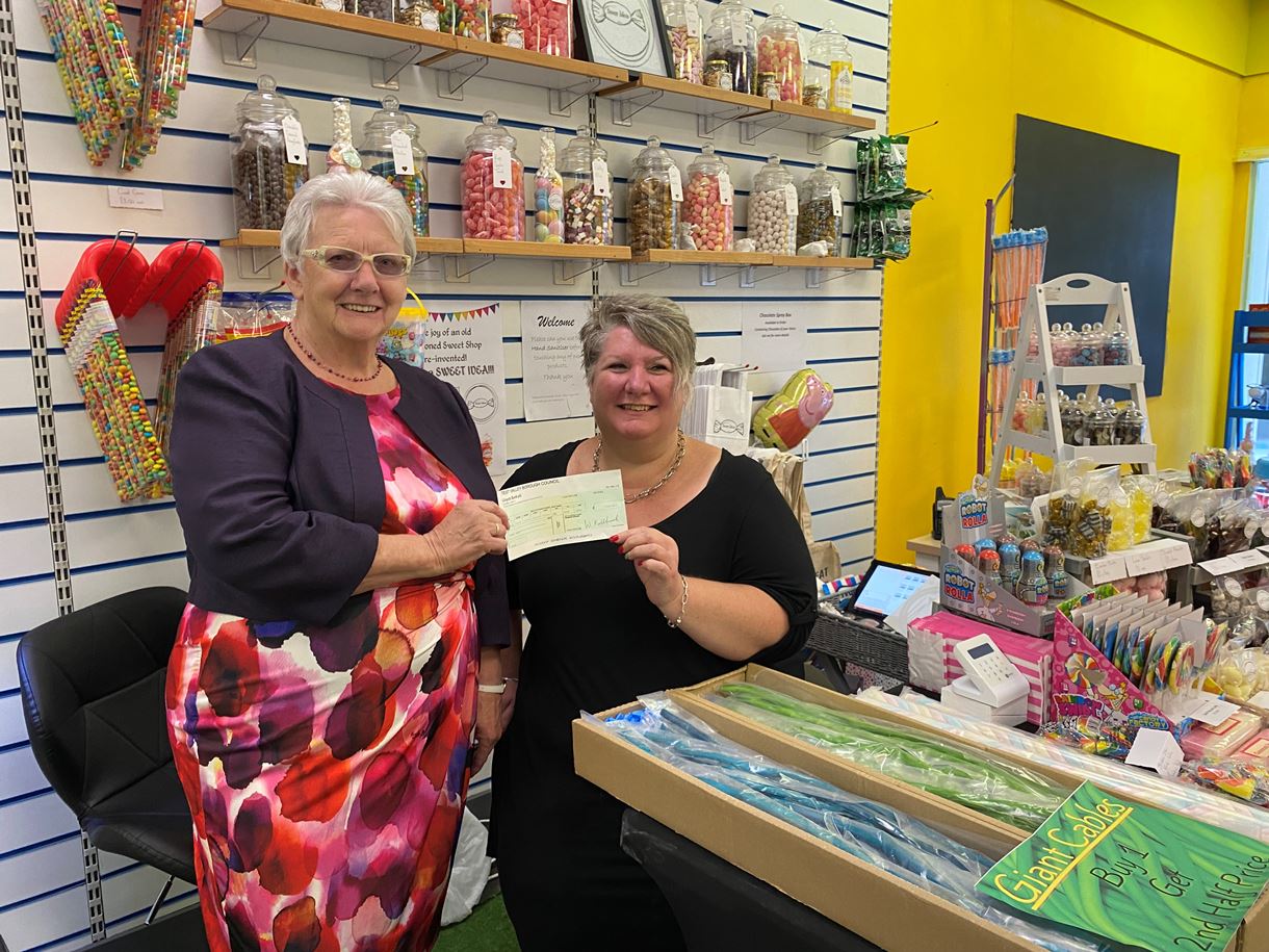 Cllr Iris Anderson presents a cheque to Joanne Tierney