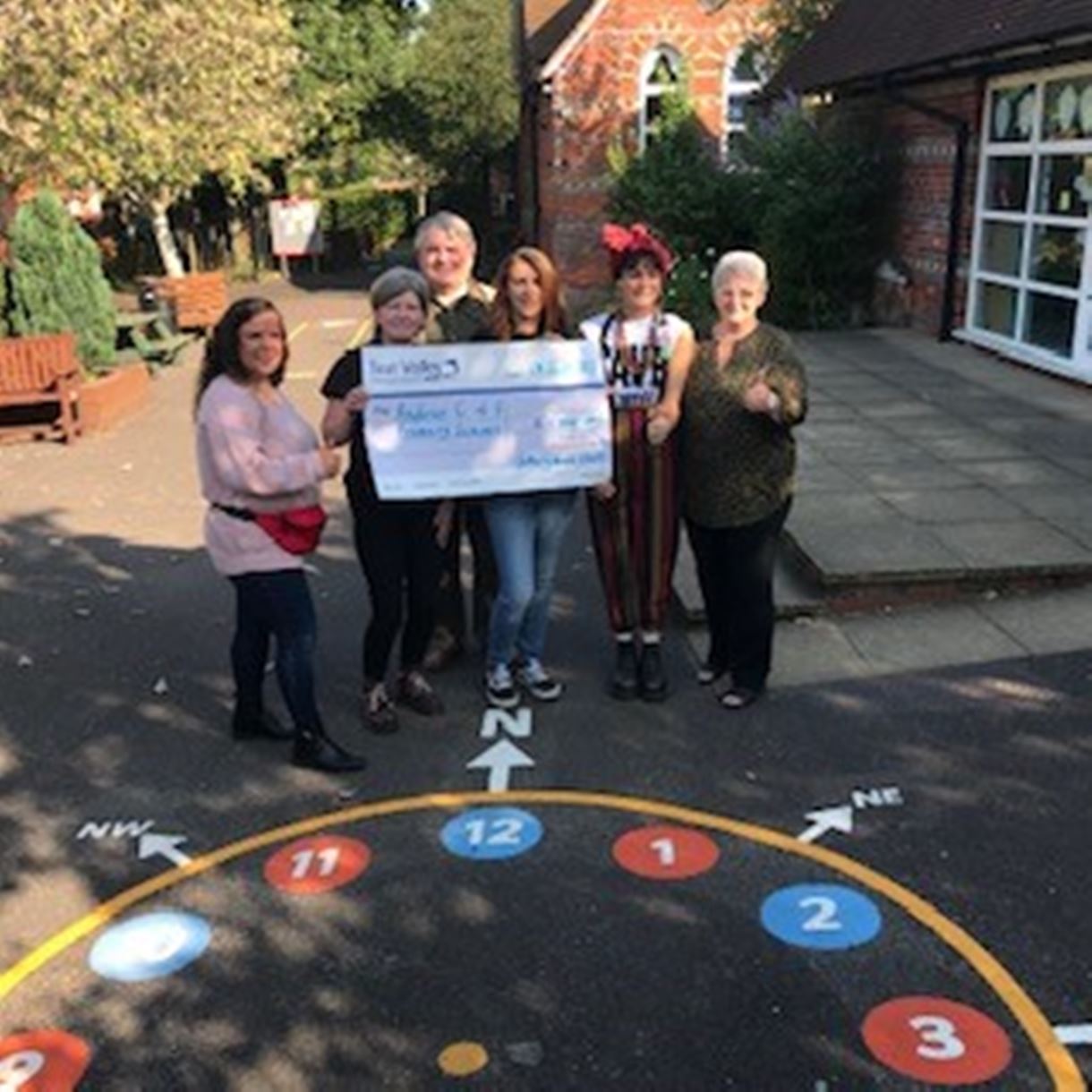 Councillor Iris Andersen presents Councillor Community Grant to Andover C of E Primary School.