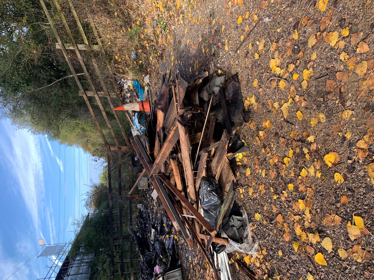 Dumped roofing material and other waste blocking part of the Test Way