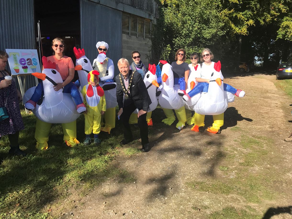 Mayor Councillor Dowden with chicken costumes