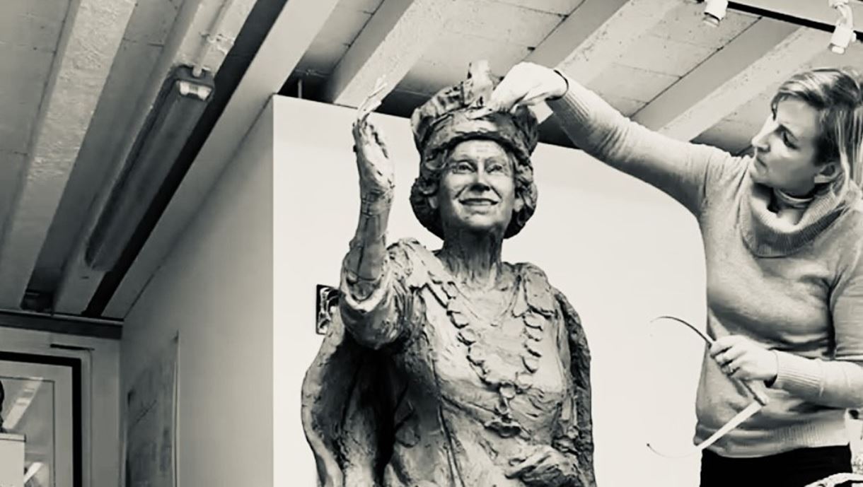 Artist Amy Goodman working on statue of Queen Elizabeth II